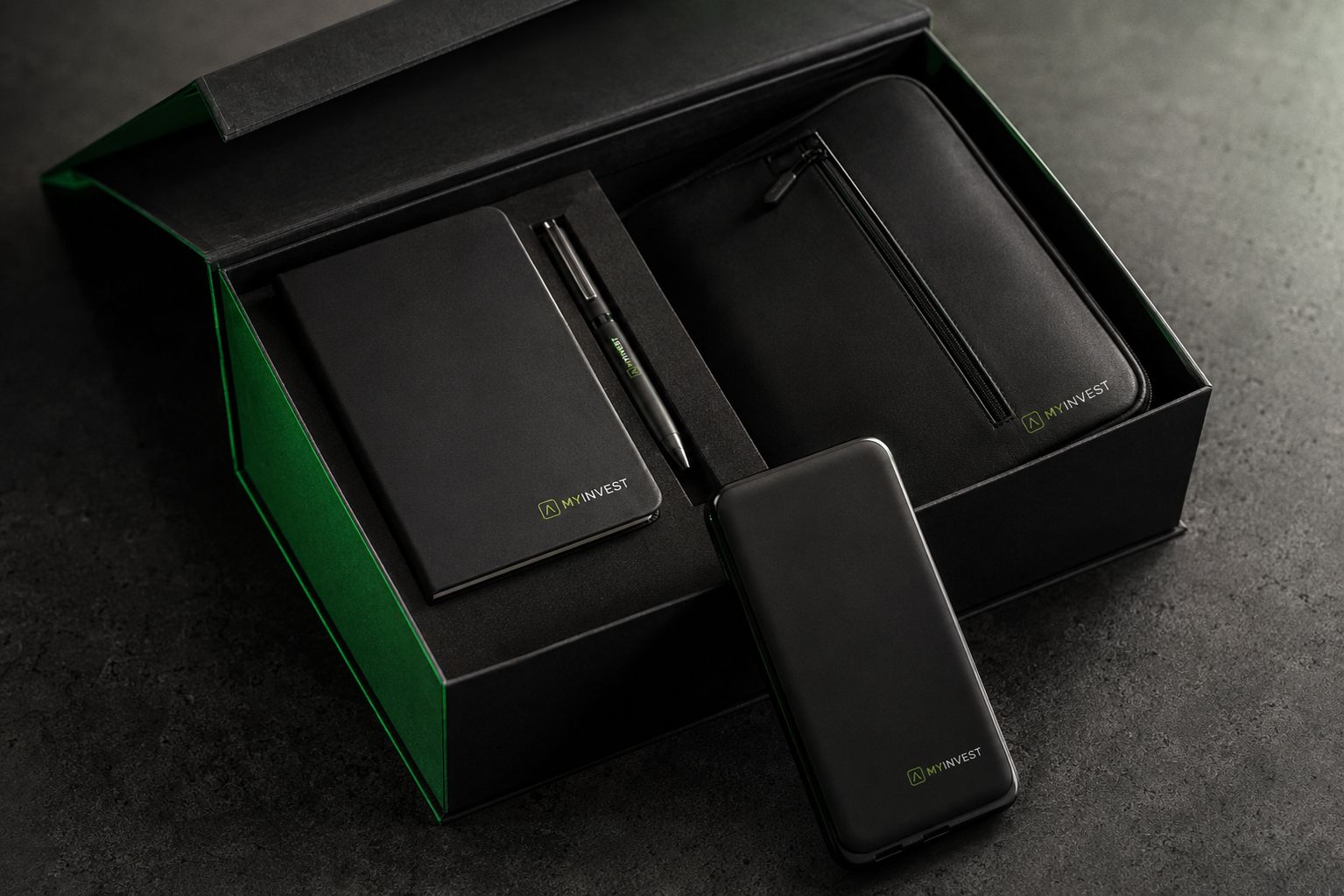 MyInvest gift box with notebook, pen, laptop sleeve and power bank